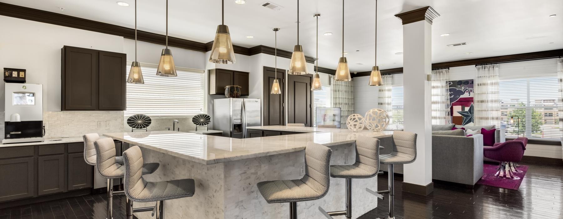 a kitchen with a table and chairs