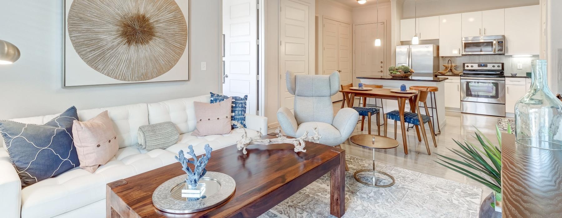 a living room with a couch and a table