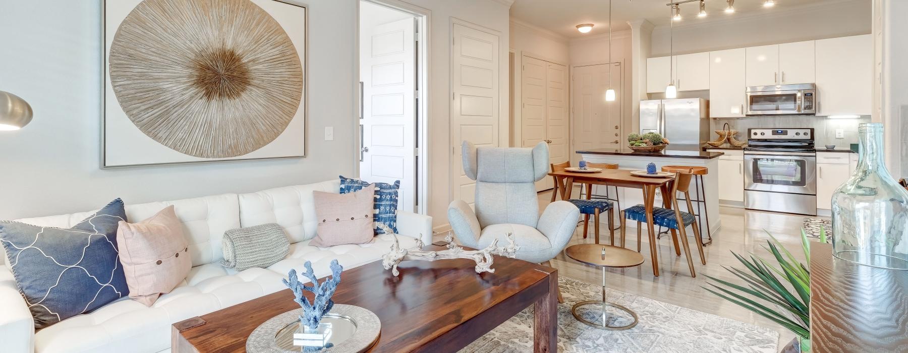 a living room with a couch and a table